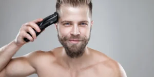 man cutting own hair